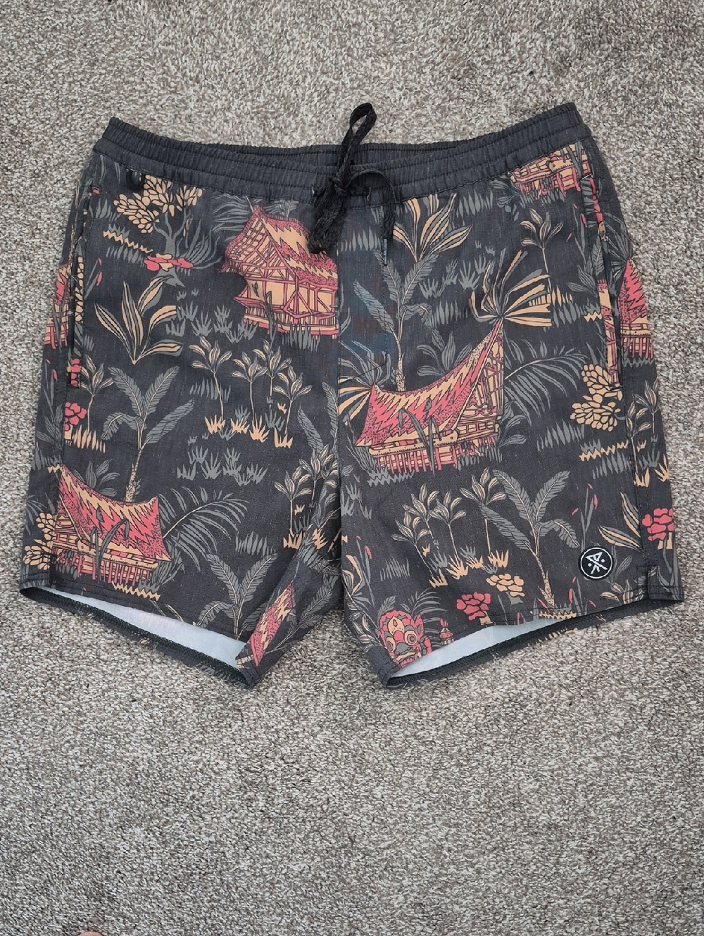 Roark Black Swim Trunks with Tan and Red Tropical Motif